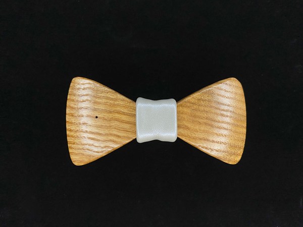 Ash wood bowtie with a white leather middle wrap.