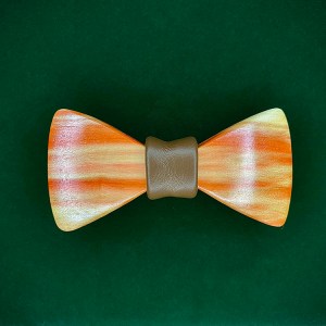 Boxelder wood bowtie with brown leather middle wrap.