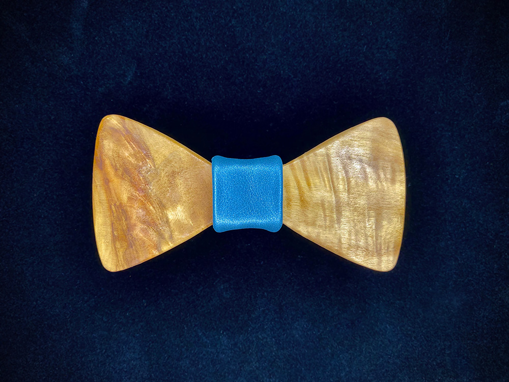 Cottonwood bowtie with blue leather middle wrap.