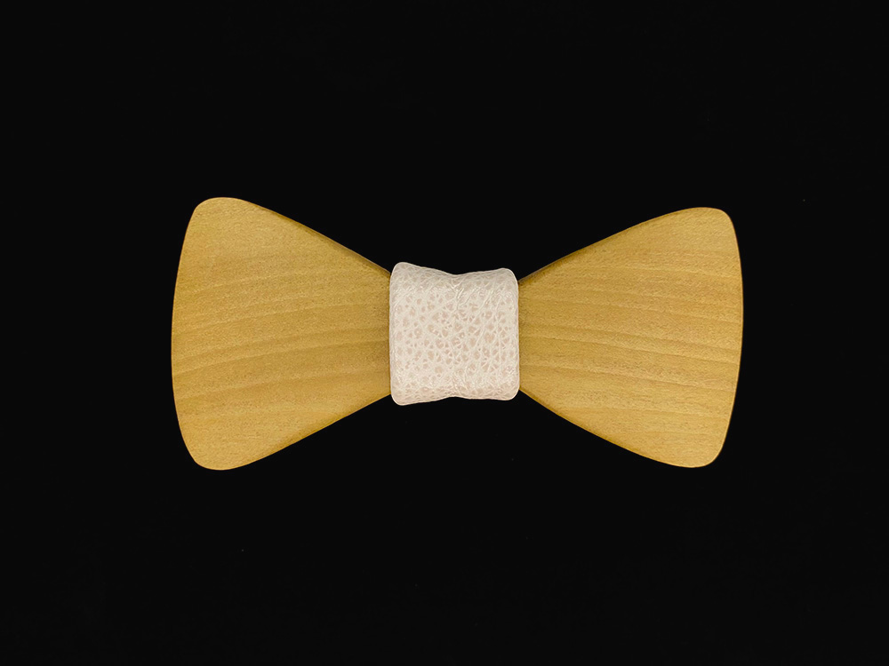 Poplar wood bowtie with a white leather middle wrap.